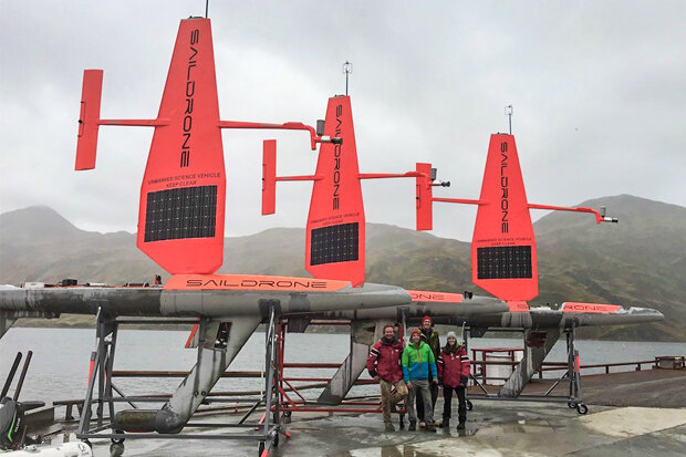 Saildrone recovery crew and three saildrones